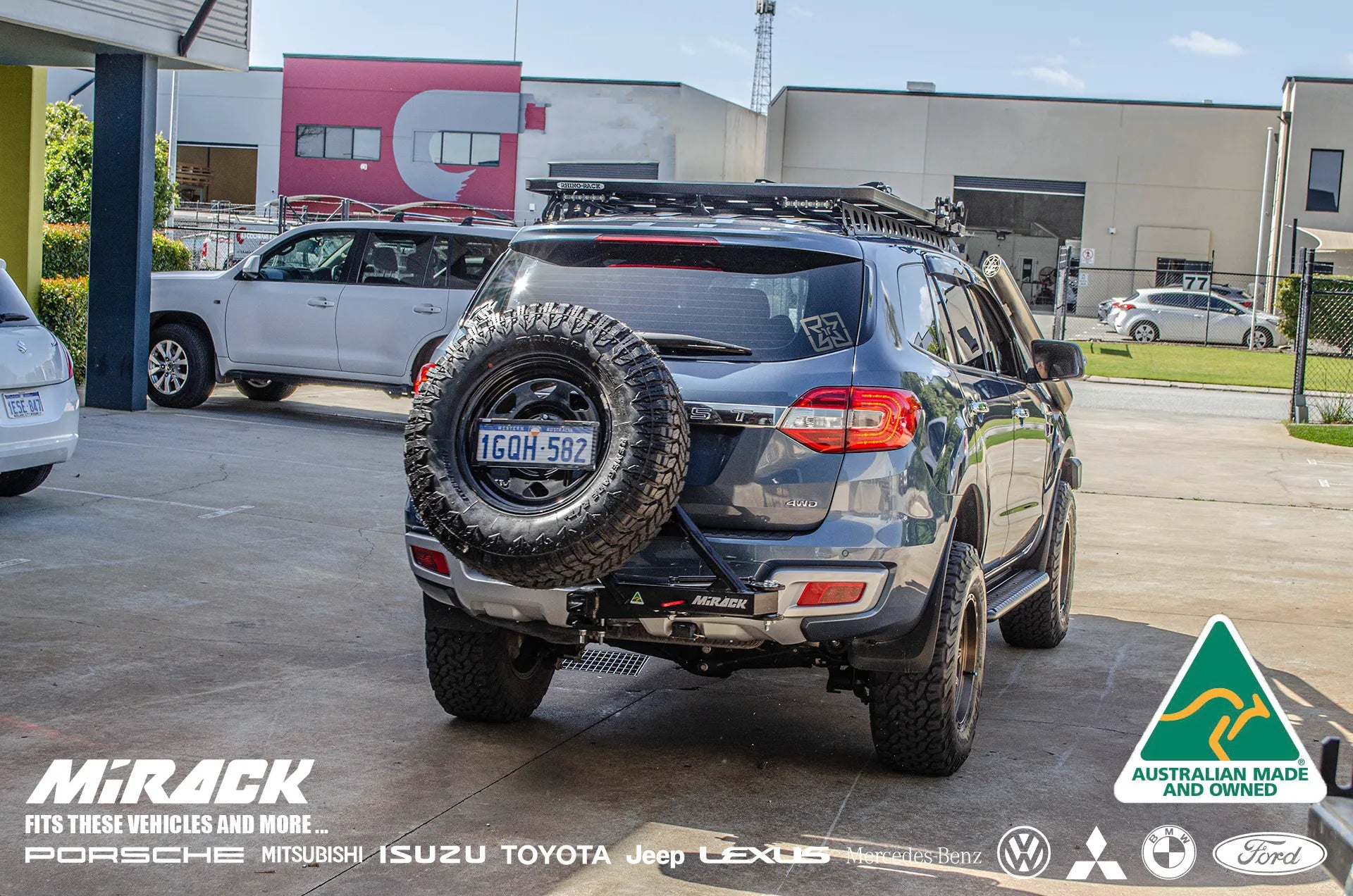 Enhance your Ford Everest's off-road capabilities with this Mirack tilting spare tyre carrier, mounted conveniently on the tow hitch.