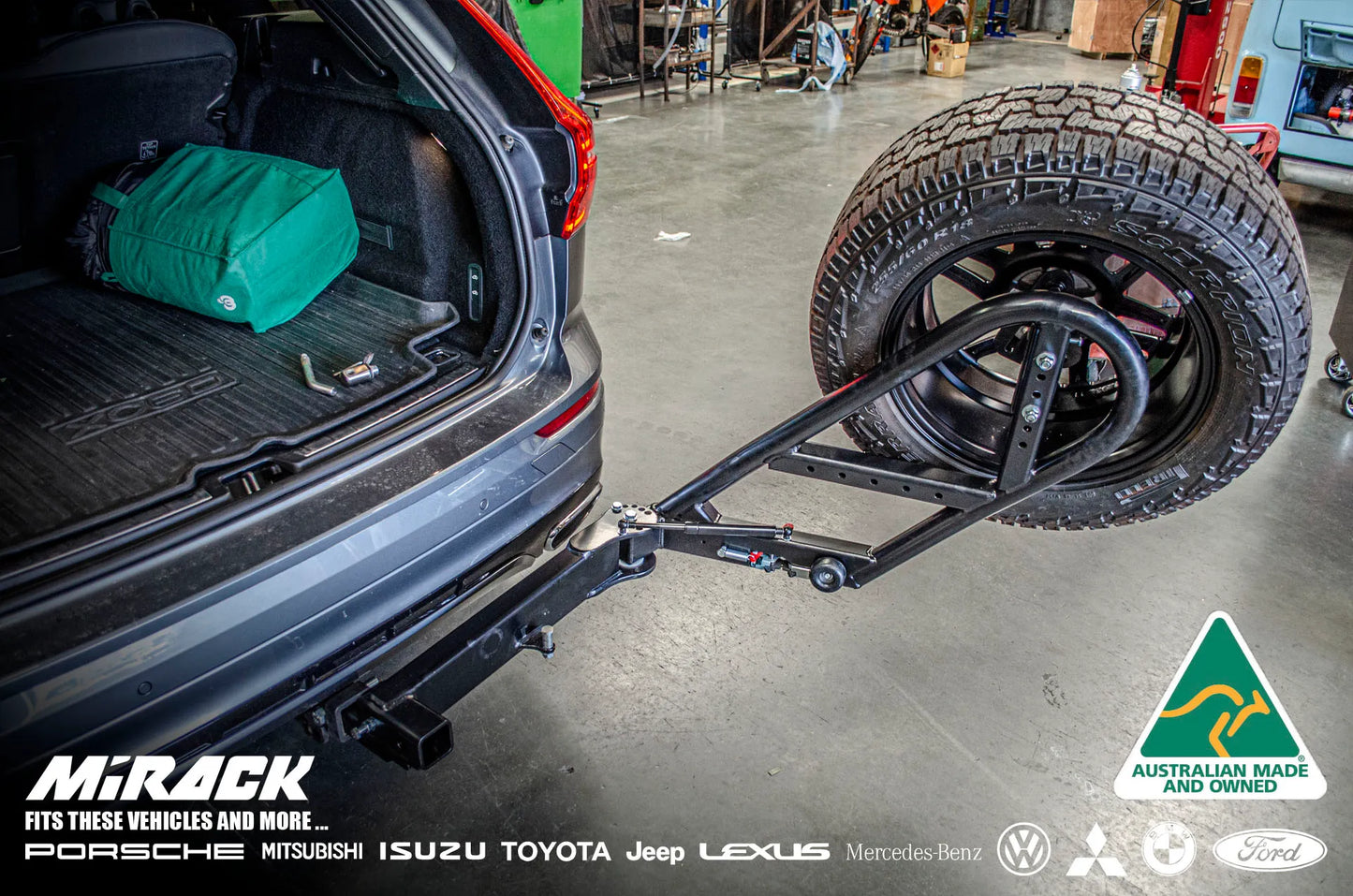Volvo XC60 conquers adventures with Mirack's swinging spare tyre carrier (hitch mount).