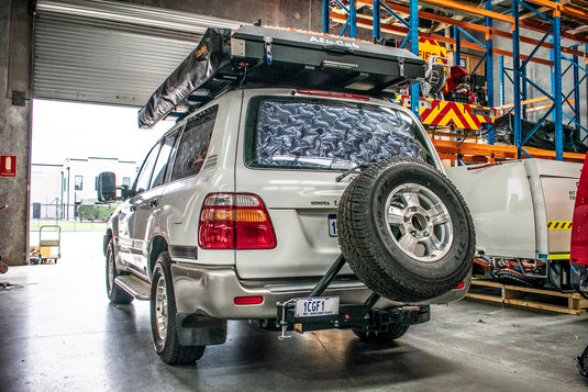 Toyota Land Cruiser 100 Series with Mirack Swinging Spare Wheel Carrier, License Plate Holder