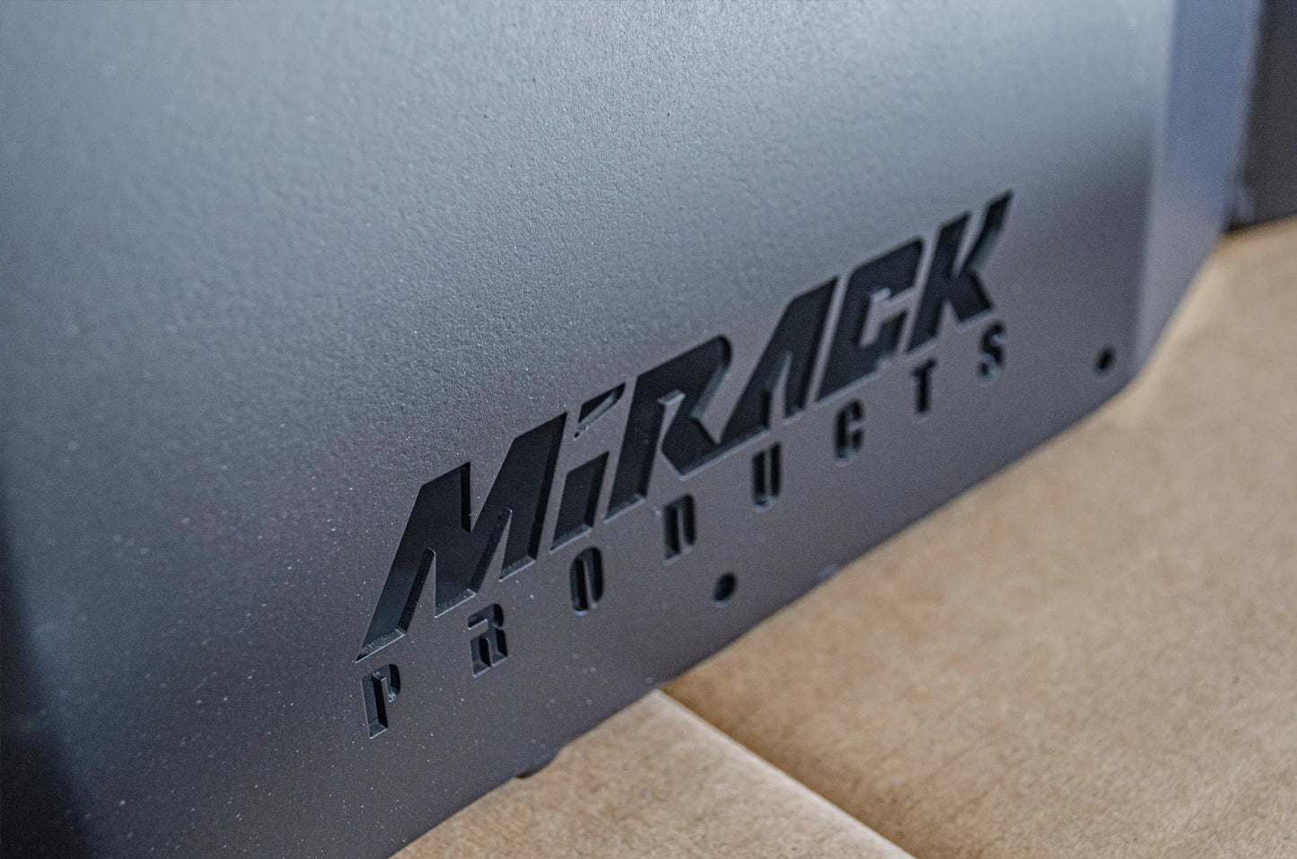Mirack's robust steel frame and laser-cut logo add strength and elegance to your jerry can storage.