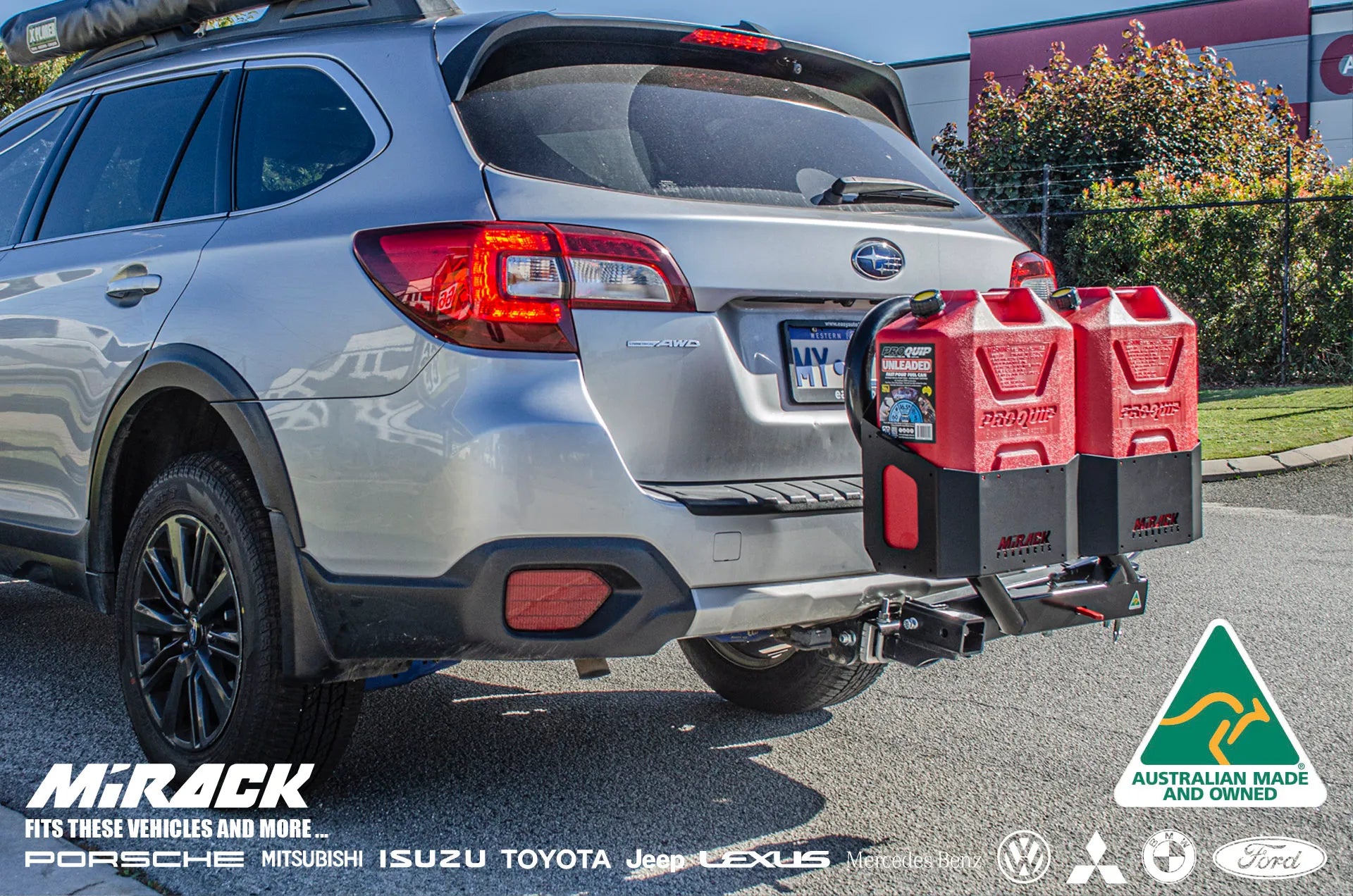 Fuel your journey, simplify access: Mirack's dual jerry can holders on your Subaru AWD offer convenient refueling alongside the swinging spare wheel carrier.