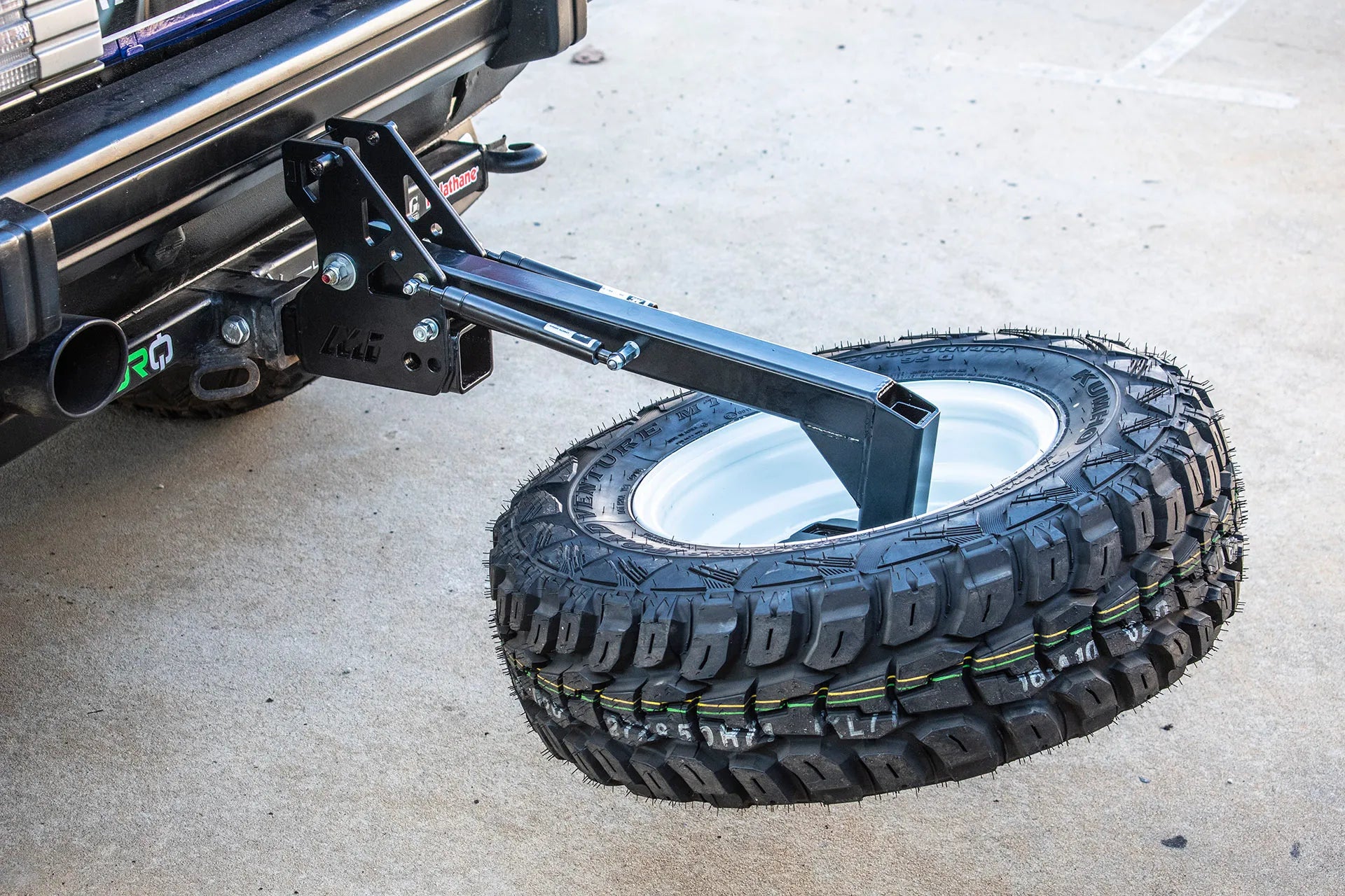 Folding hitch tire carrier hotsell