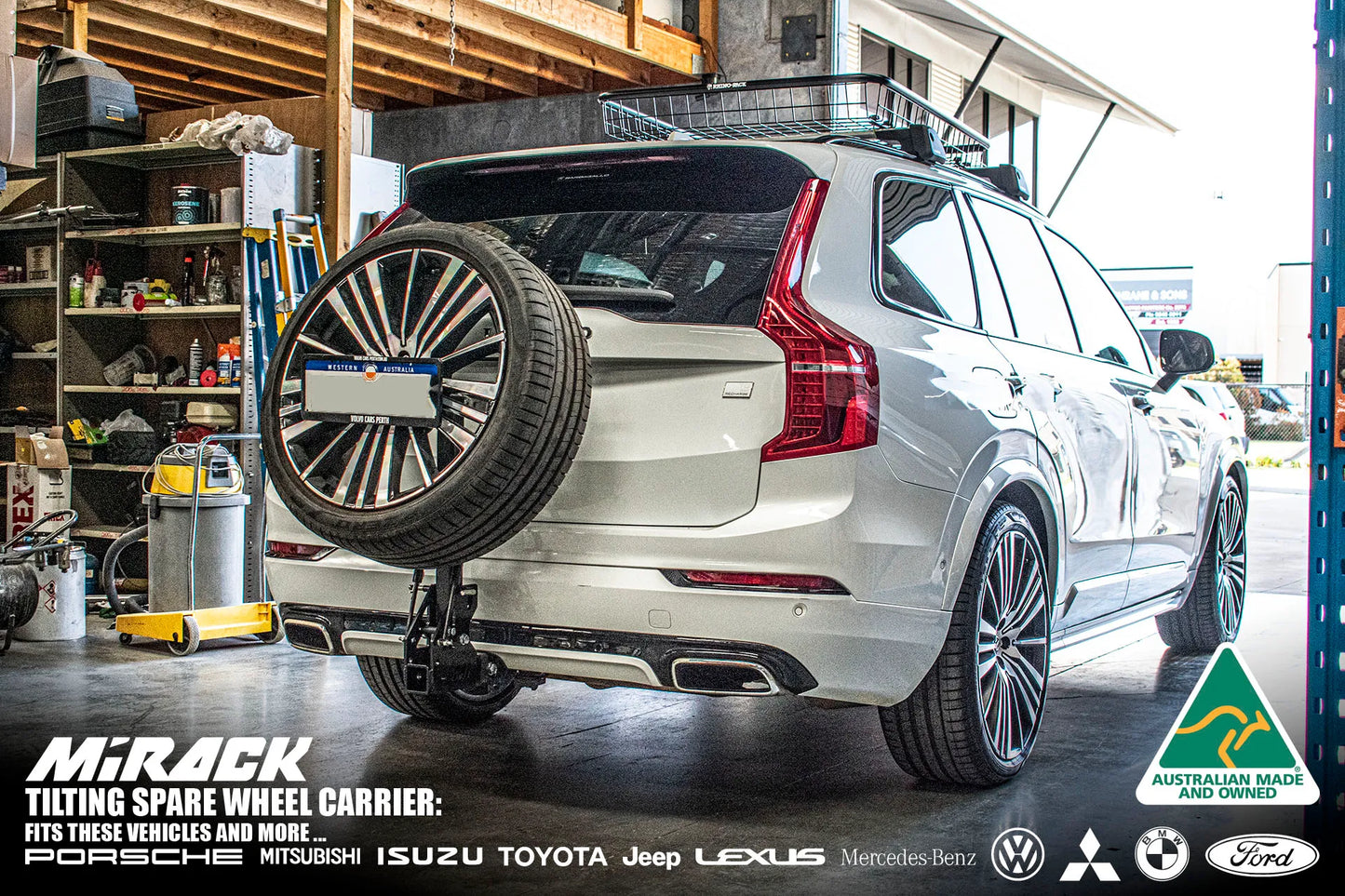 XC60's full potential: Tilting spare wheel carrier maximizes space & off-roading (tow hitch mount).